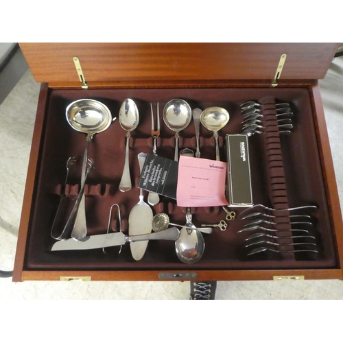 339 - An (incomplete) Wilkens silver plated canteen of cutlery and flatware, contained within a military d... 