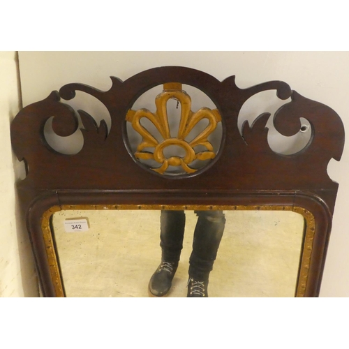 342 - An early 20thC reproduction of a Georgian mahogany framed and gilded pier glass  41