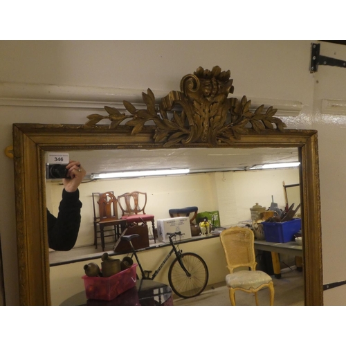 346 - A late 19thC mirror, the plate set in a carved and moulded gilt frame  62