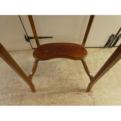 351 - An Edwardian string inlaid mahogany, kidney shaped two tier occasional table  28