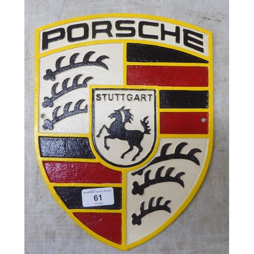 61 - A painted cast iron sign 'Porsche'  9