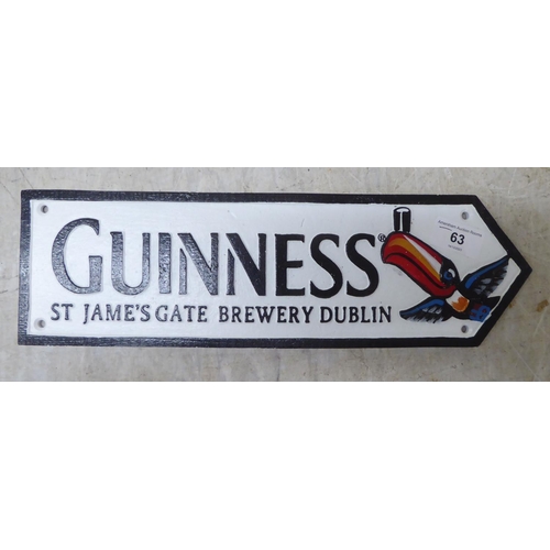 63 - A painted cast iron sign 'Guinness'  14