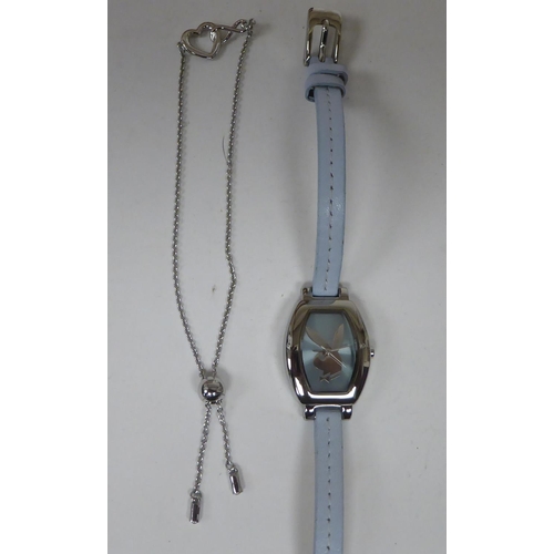 81 - A lady's Avissa wristwatch with interchangeable fittings; a Playboy wristwatch; and a Swarovski crys... 