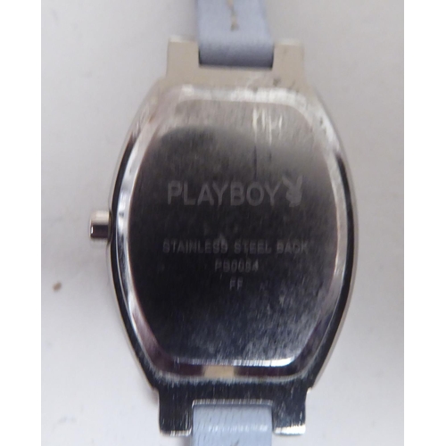 81 - A lady's Avissa wristwatch with interchangeable fittings; a Playboy wristwatch; and a Swarovski crys... 