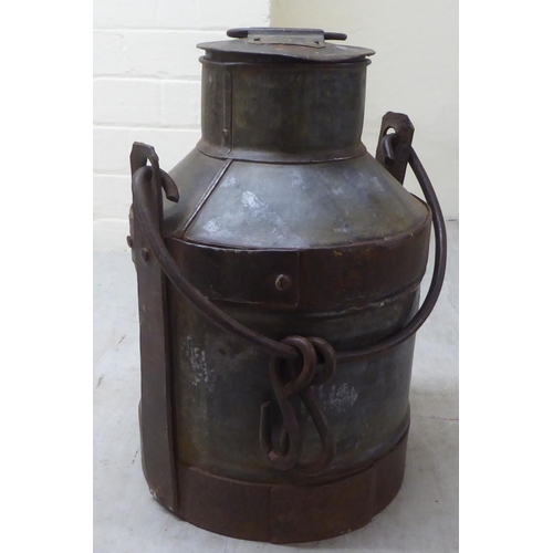 82 - A galvanised metal milk churn