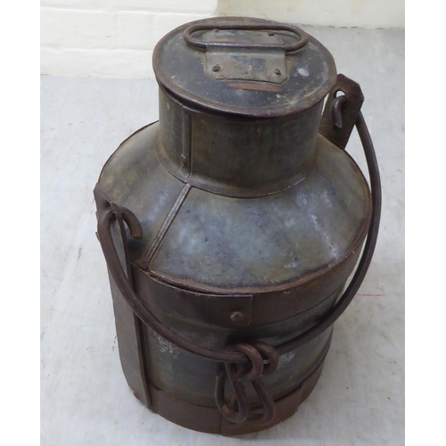 82 - A galvanised metal milk churn