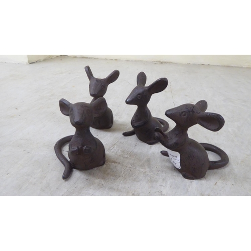 96 - A set of four cast iron mice  3.5