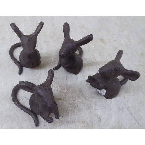 96 - A set of four cast iron mice  3.5