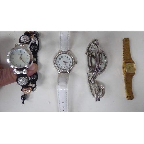 98 - Seven ladies variously designed modern wristwatches: to include Tissot, Rotary, Sekonda and Timex