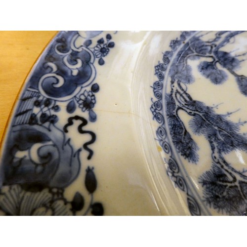 153 - An 18thC Chinese porcelain plate, decorated in blue and white  13