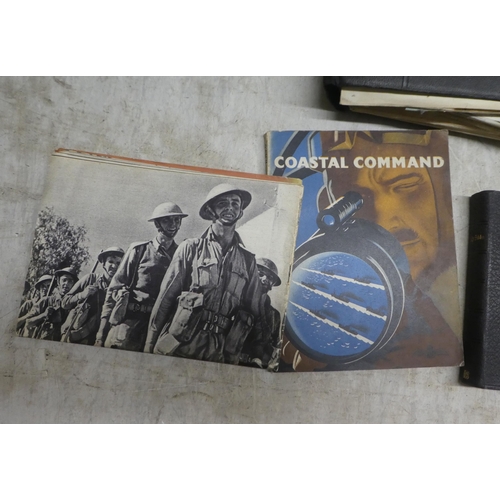 129 - 20thC ephemera: to include a World War II period album; photographs; and contemporary postcards