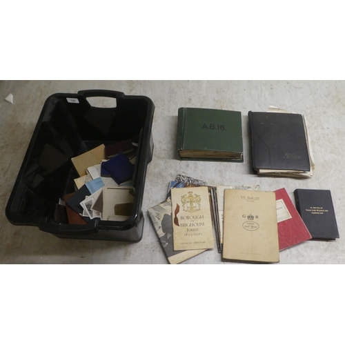 129 - 20thC ephemera: to include a World War II period album; photographs; and contemporary postcards