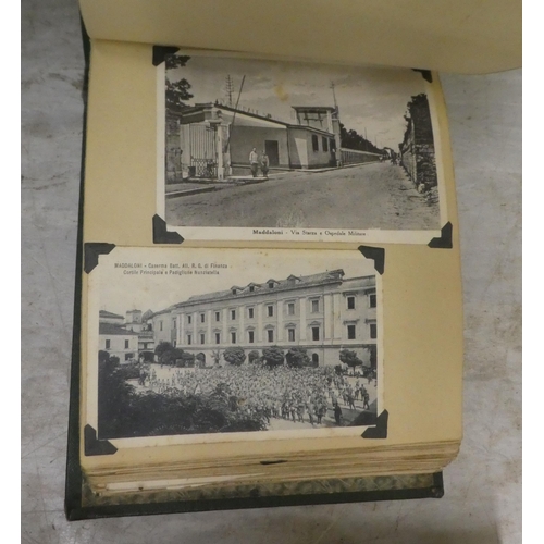 129 - 20thC ephemera: to include a World War II period album; photographs; and contemporary postcards