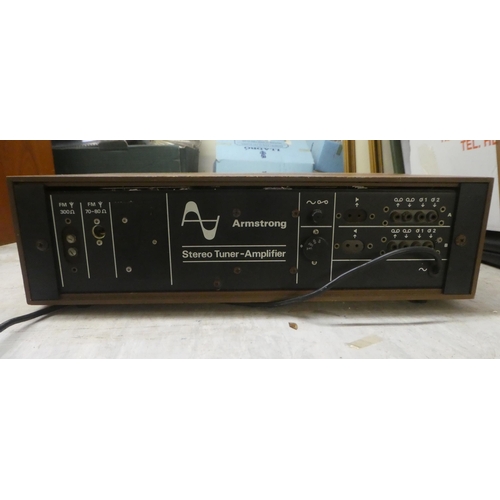 143 - A teak and tinted plastic cased Goldring Lenco GL75 stereo transcription turntable; an Armstrong 525... 