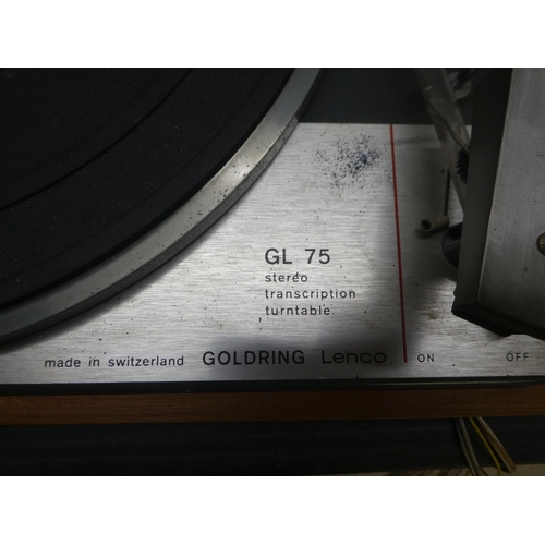 143 - A teak and tinted plastic cased Goldring Lenco GL75 stereo transcription turntable; an Armstrong 525... 
