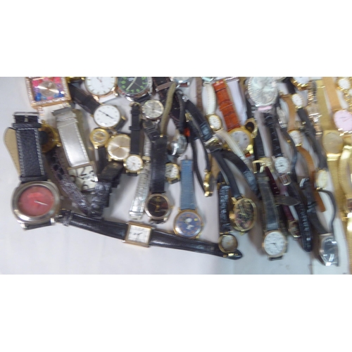 149 - Variously cased wristwatches: to include a Timex, faced by a baton dial