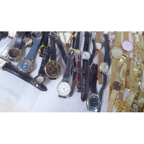 149 - Variously cased wristwatches: to include a Timex, faced by a baton dial