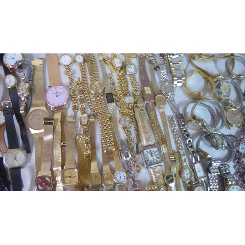 149 - Variously cased wristwatches: to include a Timex, faced by a baton dial