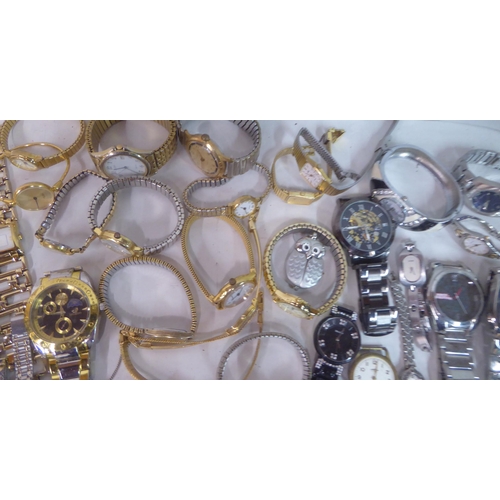 149 - Variously cased wristwatches: to include a Timex, faced by a baton dial