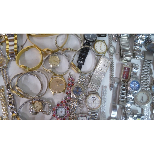 149 - Variously cased wristwatches: to include a Timex, faced by a baton dial