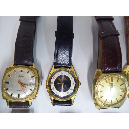 150 - Variously cased 1970/80s wristwatches: to include a Bulova, faced by a baton dial