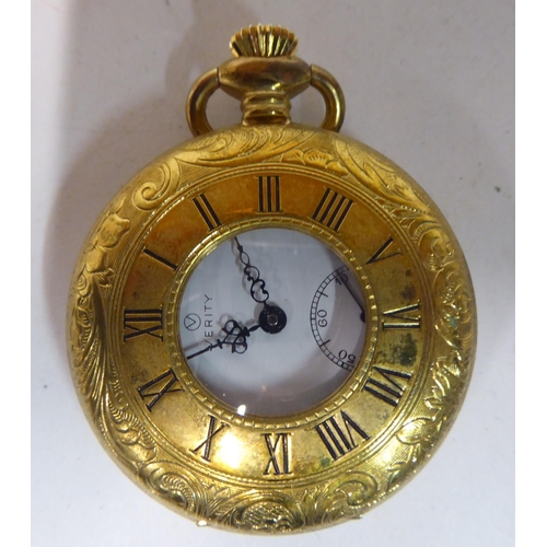 157 - Variously cased pocket watches: to include a yellow metal half-hunter, faced by a Roman dial