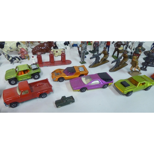 18 - Toys and games: to include puzzles; diecast model vehicles; and painted lead figures