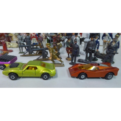 18 - Toys and games: to include puzzles; diecast model vehicles; and painted lead figures