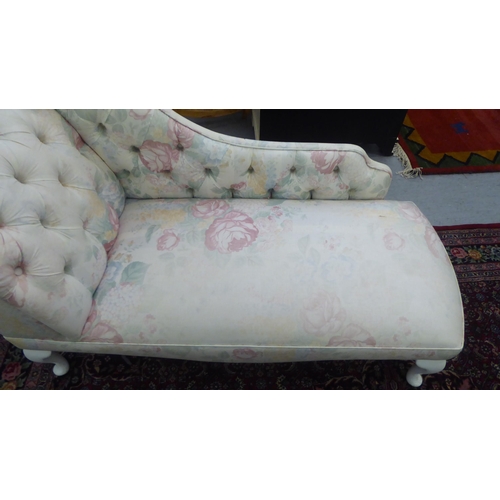 184 - A child's modern Edwardian style nursery chaise longue, decorated in floral patterned, white and pas... 