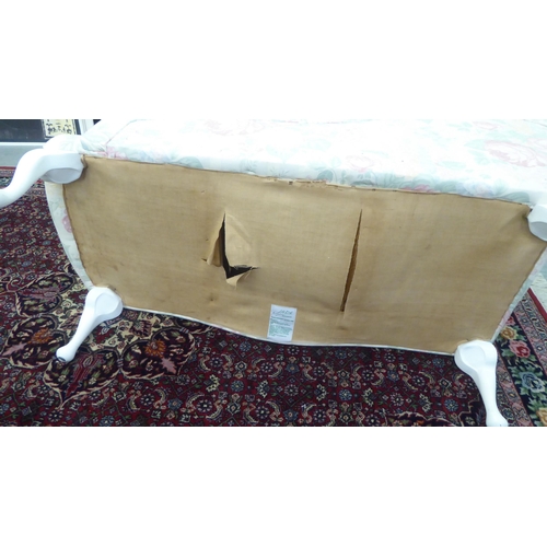 184 - A child's modern Edwardian style nursery chaise longue, decorated in floral patterned, white and pas... 