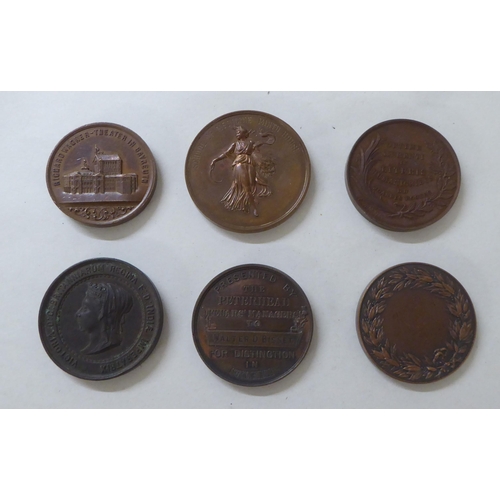 197 - White metal, bronze and other medallions and awards: to include a 1902 example