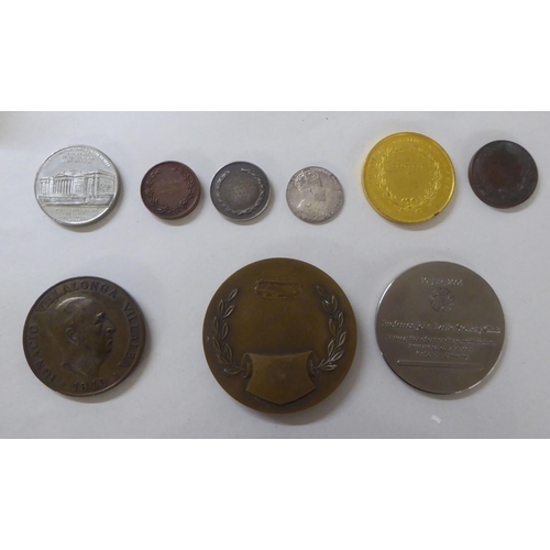 197 - White metal, bronze and other medallions and awards: to include a 1902 example