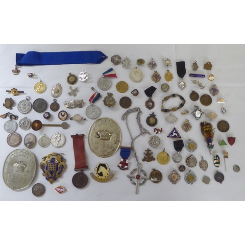 204 - Silver and other medallions: to include two Covent Garden Market badges; and a Mayoral enamel badge