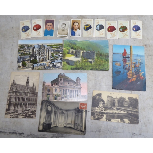 207 - Uncollated used postcards and cigarette cards: to include examples by Black Cat