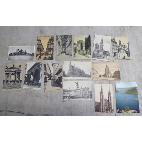 207 - Uncollated used postcards and cigarette cards: to include examples by Black Cat