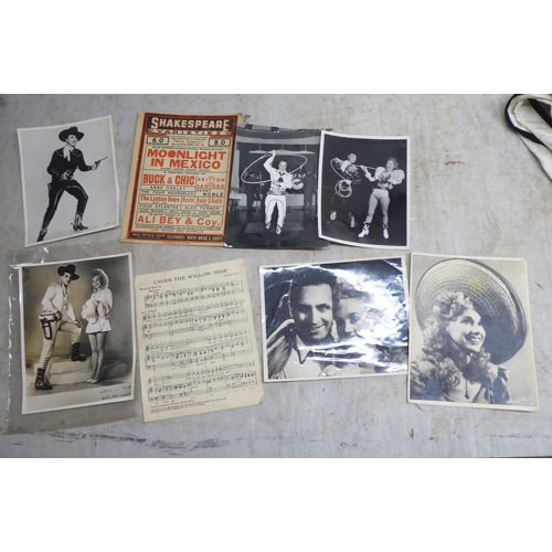 209 - A cowboy outfit with an accompanying photograph and sheet music