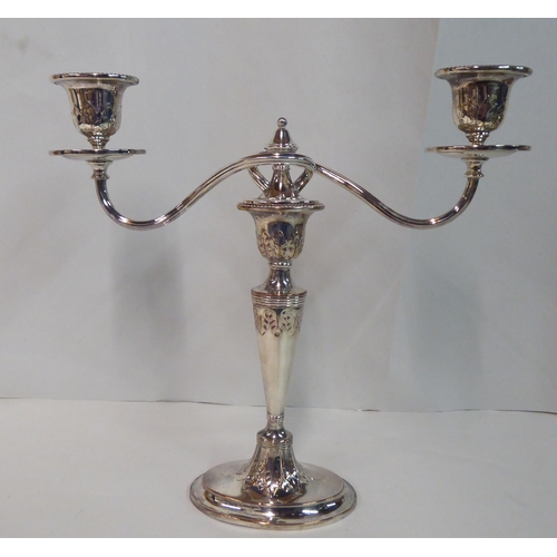 21 - A pair of 20thC Victorian style, silver plated, twin branch candelabra  20