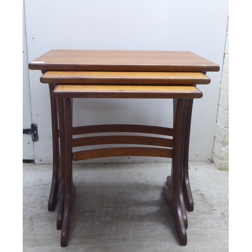 210 - A nesting set of three G-Plan teak occasional tables  largest 20