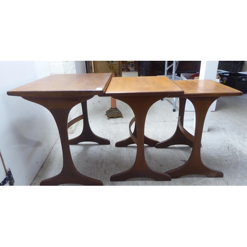 210 - A nesting set of three G-Plan teak occasional tables  largest 20