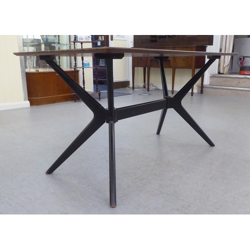 220 - A G-Plan Tola teak dining table, raised on a black painted splayed underframe  29