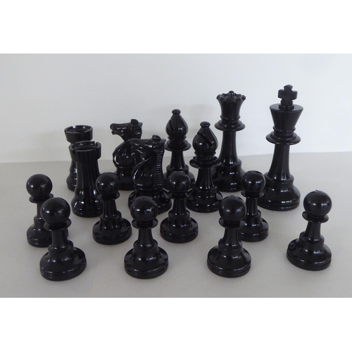 240 - A composition chess set, in a Jaques box