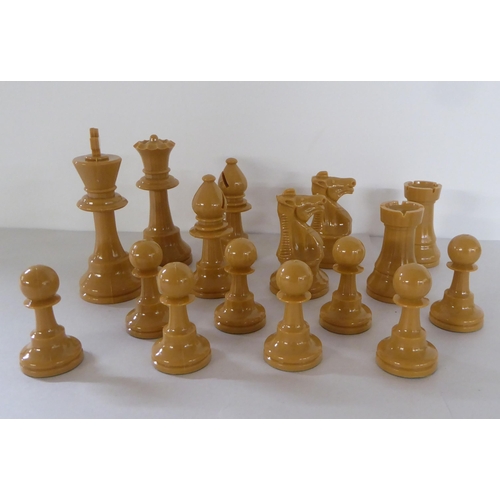 240 - A composition chess set, in a Jaques box