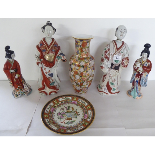 243 - 20thC Oriental ceramics: to include Japanese porcelain figures  largest 14