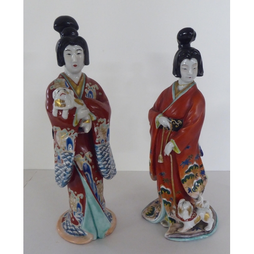 243 - 20thC Oriental ceramics: to include Japanese porcelain figures  largest 14