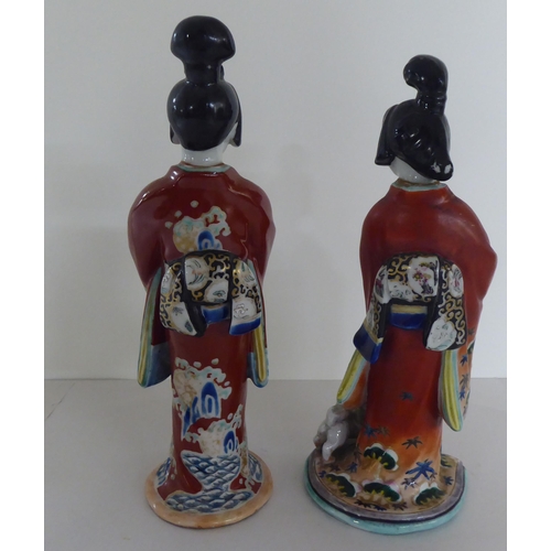 243 - 20thC Oriental ceramics: to include Japanese porcelain figures  largest 14