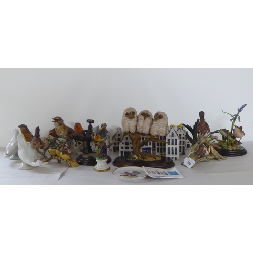 253 - Decorative ceramics: to include Goebel china model birds  largest 5