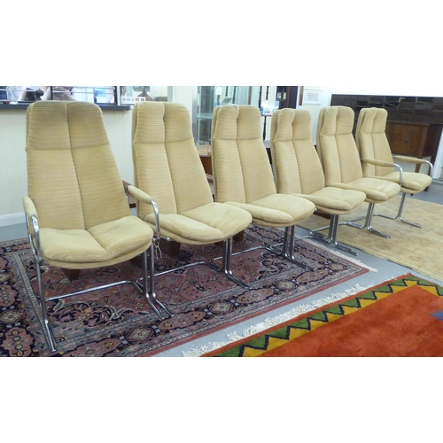 258 - A set of six Pieff dining chairs, the chromium plated frames and fabric covered back and seats raise... 