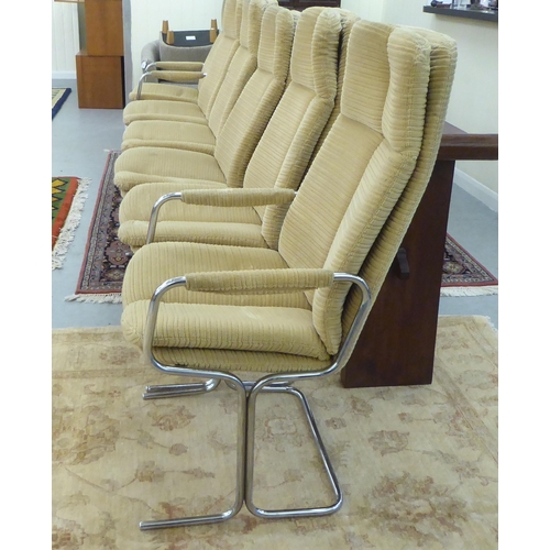 258 - A set of six Pieff dining chairs, the chromium plated frames and fabric covered back and seats raise... 