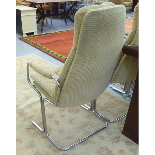 258 - A set of six Pieff dining chairs, the chromium plated frames and fabric covered back and seats raise... 