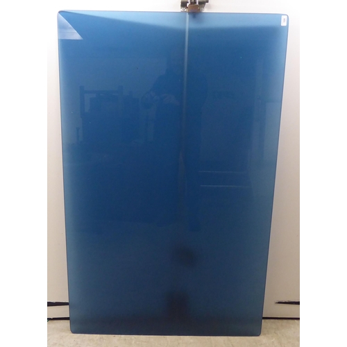 326 - A sheet of part-frosted blue tinted glass with curved ends  59